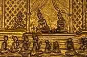 Luang Prabang, Laos - Wat Mai the gilded stucco engravings narrate the Vessantara Jataka, the penultimate rebirth as a human of the future Gotama Buddha.